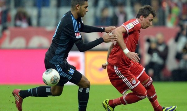  拜仁慕尼黑提前锁定半程冠军，德甲统治力彰显无遗  